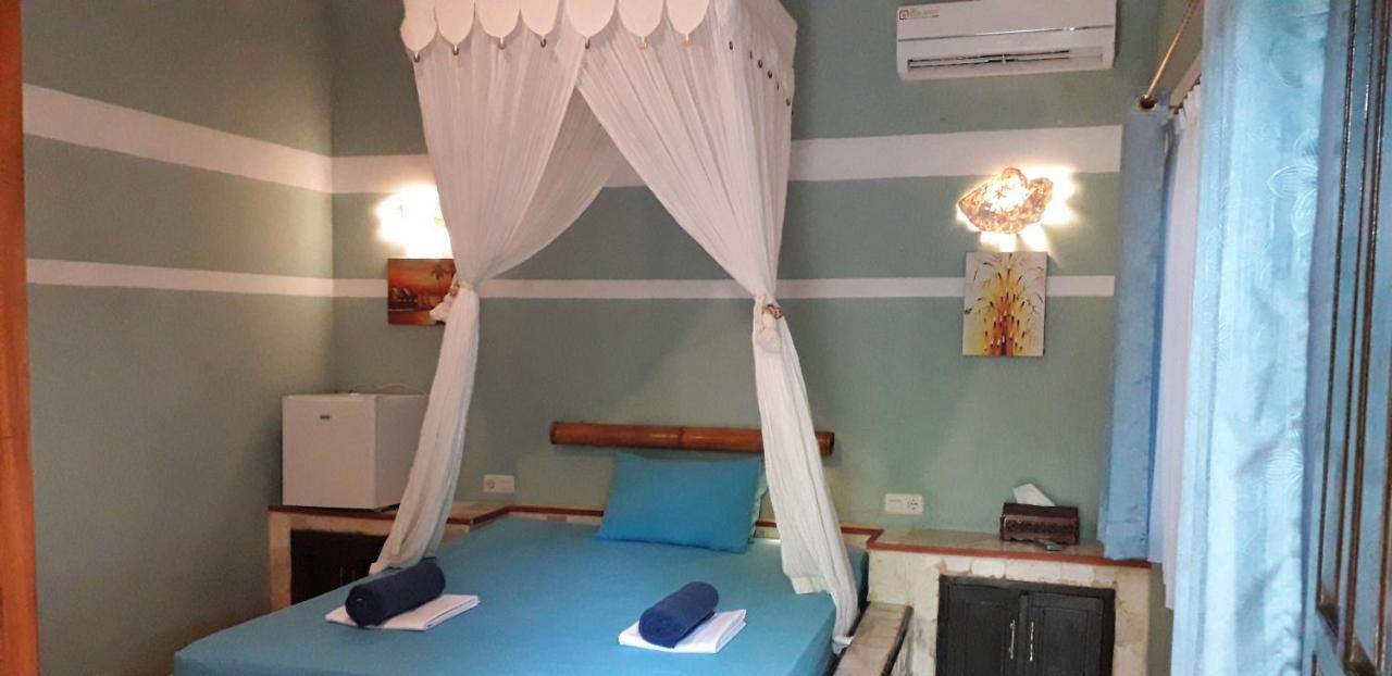 Mangga Lodge Bira Esterno foto