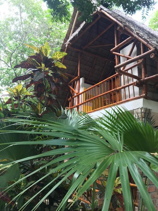 Mangga Lodge Bira Esterno foto